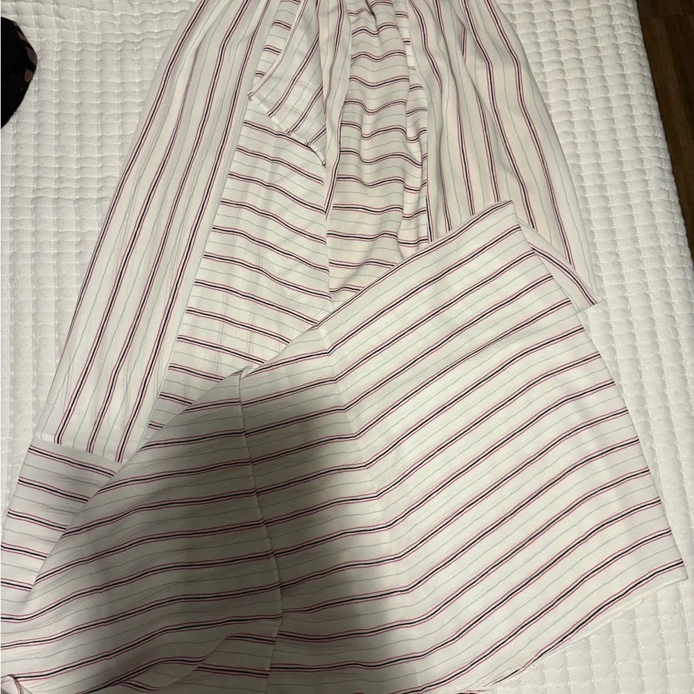 Colorful Patterned Clothing Stack - Picture 3 of 13